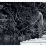 Fishing off dock in Hole in the Wall, 1964